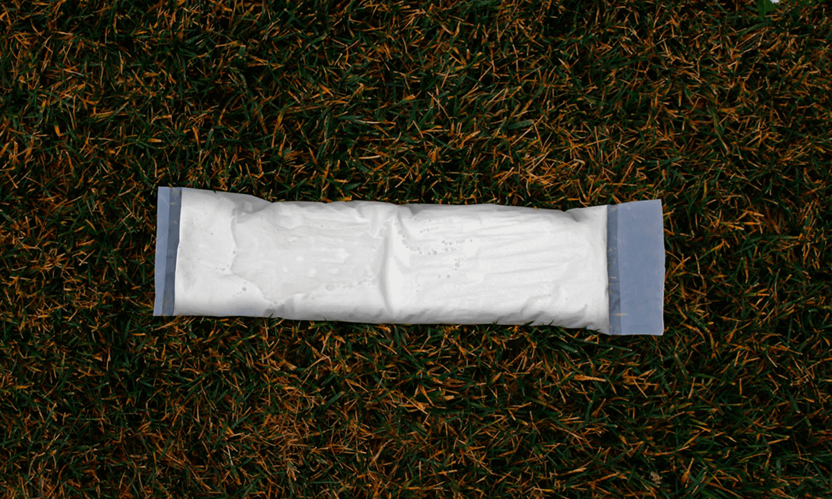 Compostable biopolymers and home composts for flexible containers for liquids.